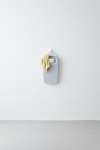Washboard hanging on wall hook storage