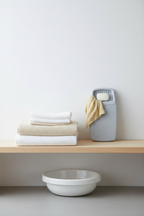 Washboard on shelf with folded towels in laundry room